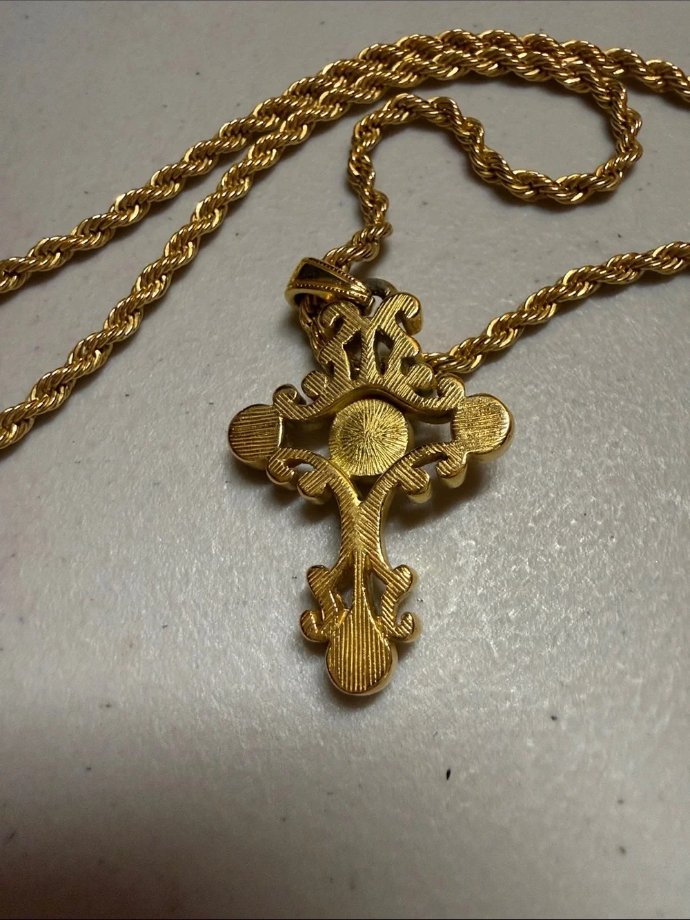 Elegant Goldtone Cross Pendant Necklace with Pink and Lavender Cabochons